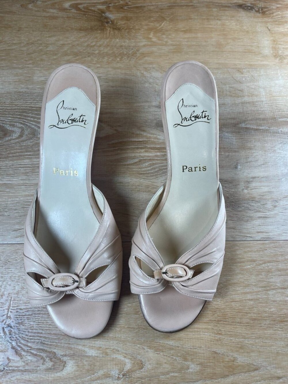 Christian Louboutin beige buckle kitten heel mules